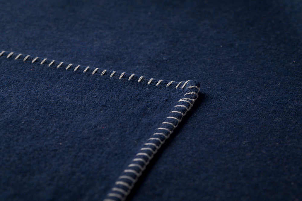 SYLT throw solid in . Throw Blanket made by David Fussenegger , a family-run mill in Austria.