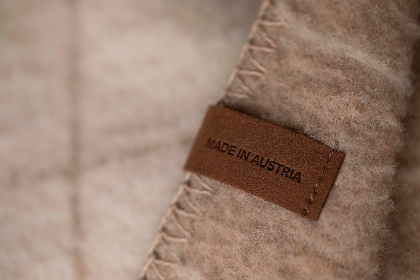 MERANO throw "checkered" in . made by INDIGO 11 , a family-run mill in Austria.