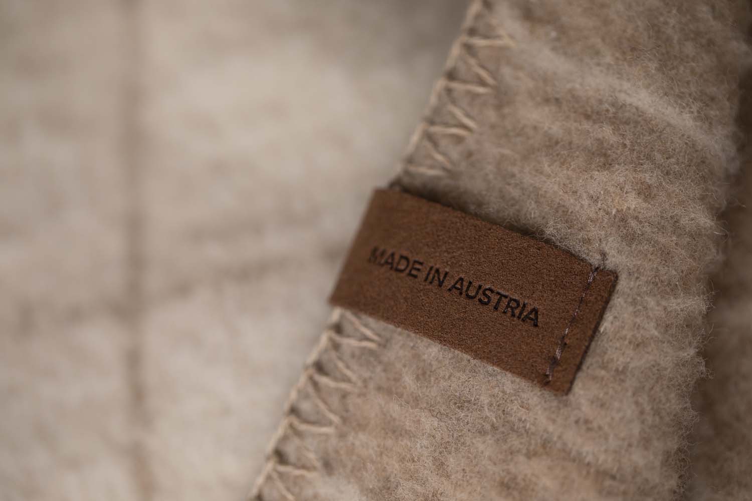 MERANO throw "checkered" in . made by INDIGO 11 , a family-run mill in Austria.