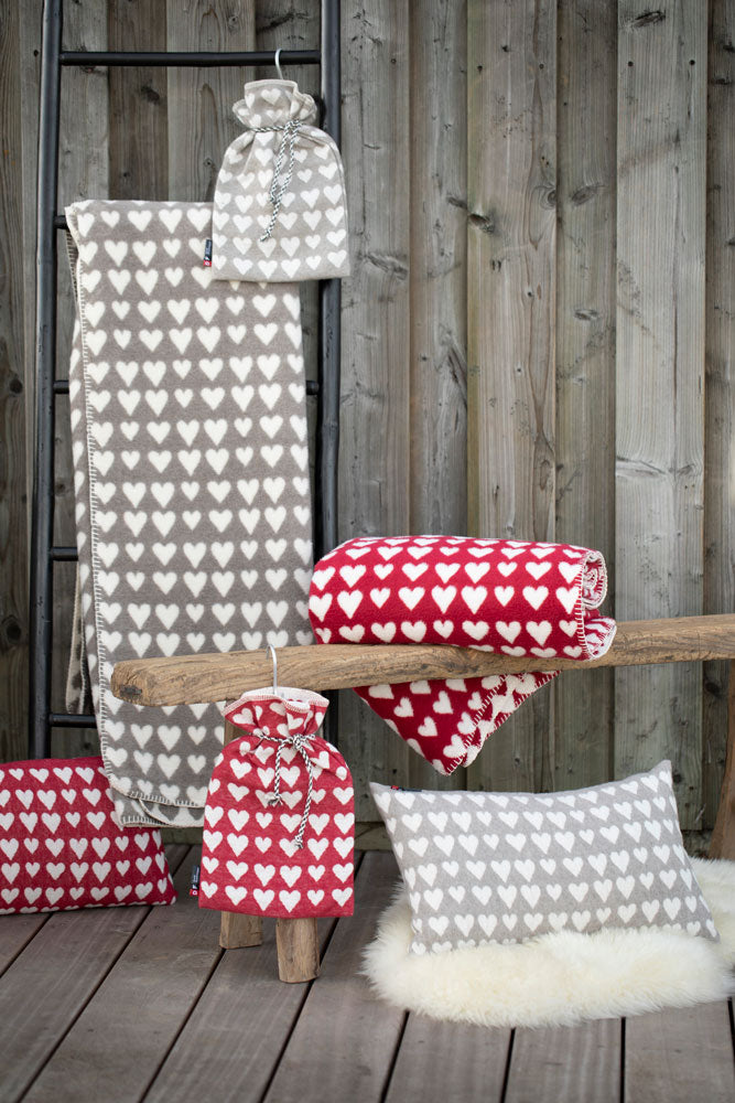 SILVRETTA warming bottle "hearts" in . Warming Bottle made by David Fussenegger , a family-run mill in Austria.