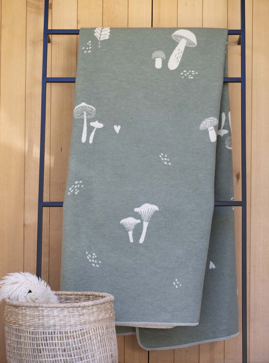 SILVRETTA throw "mushrooms'n more" in . Throw Blanket made by David Fussenegger , a family-run mill in Austria.