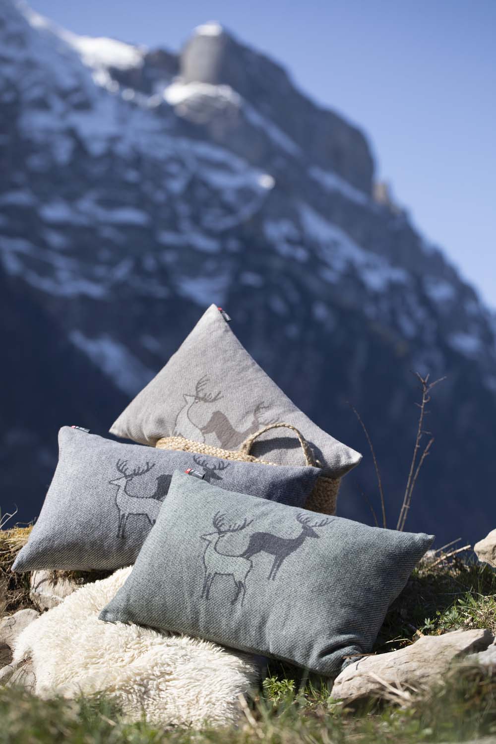 SILVRETTA cushion cover "pair of stags" in . Cushion Cover made by David Fussenegger , a family-run mill in Austria.