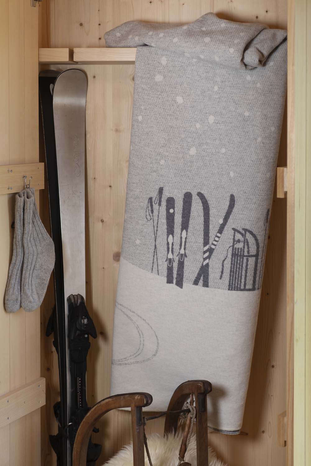 SILVRETTA throw "skis & tobbogan" in . Throw Blanket made by David Fussenegger , a family-run mill in Austria.