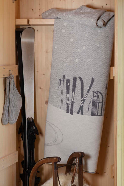 SILVRETTA throw "skis & tobbogan" in . Throw Blanket made by David Fussenegger , a family-run mill in Austria.
