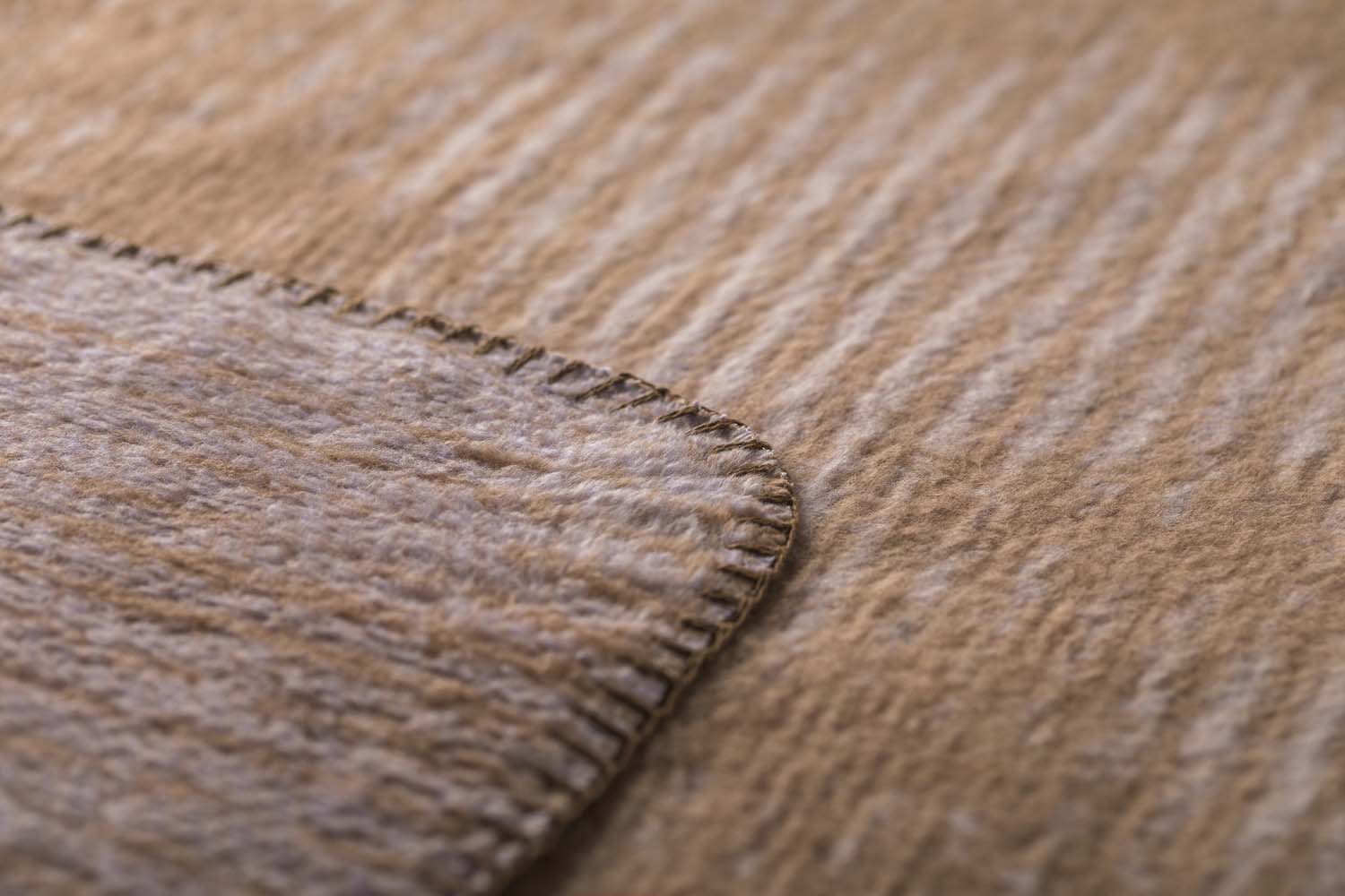 SAVONA throw "structures" in . Throw Blanket made by David Fussenegger , a family-run mill in Austria.