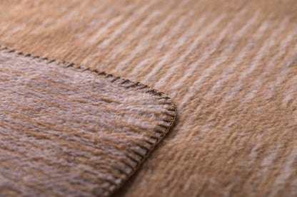 SAVONA throw "structures" in . Throw Blanket made by David Fussenegger , a family-run mill in Austria.