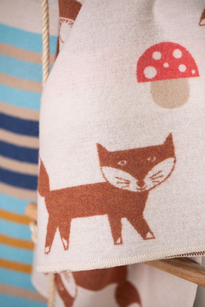 JUWEL baby blanket "fox and mushroom" in . Blanket made by David Fussenegger , a family-run mill in Austria.