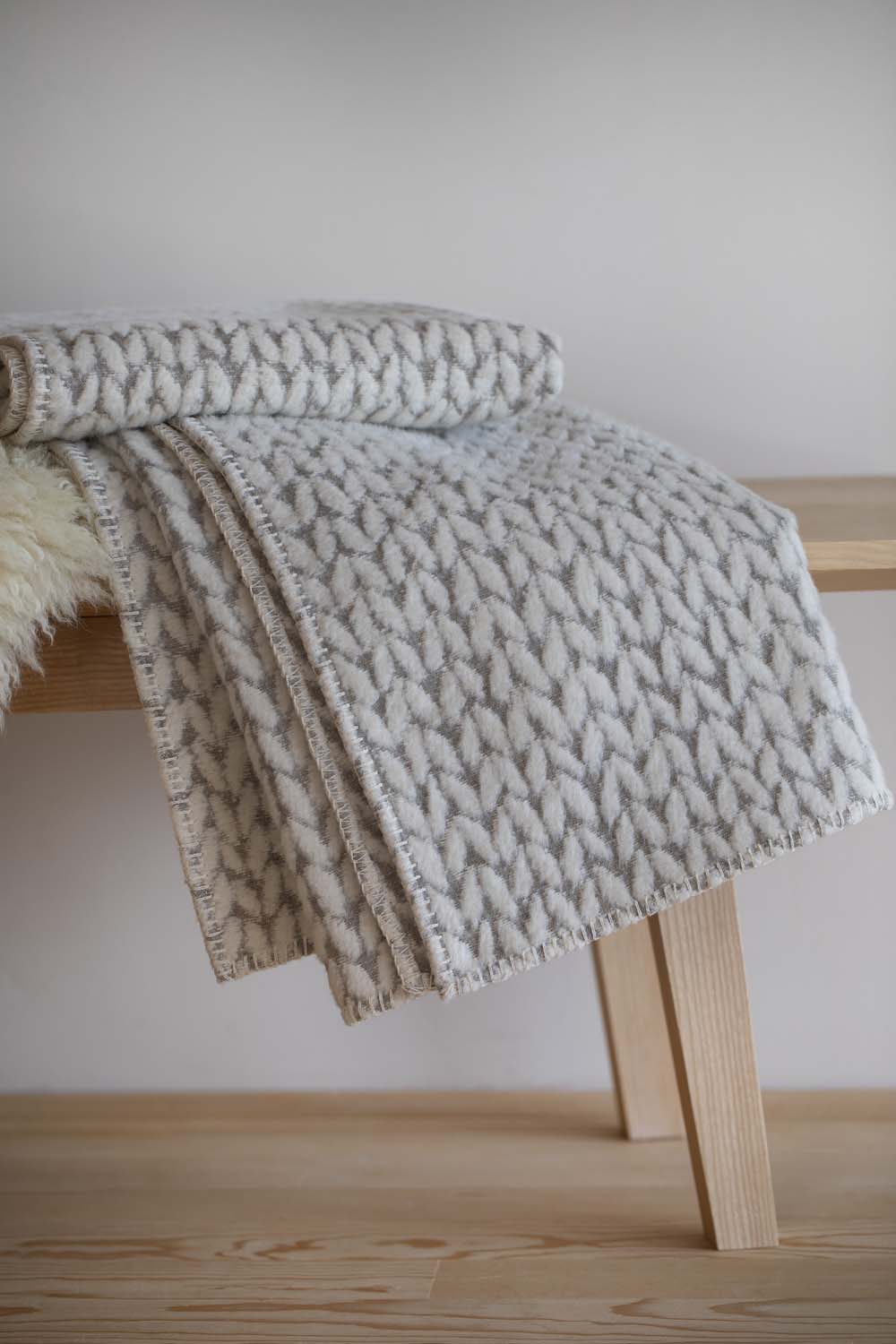 CARLA throw "knitted pattern" in . Throw Blanket made by David Fussenegger , a family-run mill in Austria.