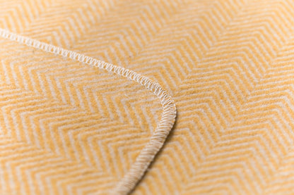 SILVRETTA throw "herringbone" in . Throw Blanket made by David Fussenegger , a family-run mill in Austria.