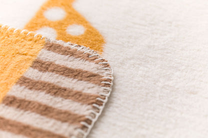 MILA kid blanket "giraffes allover" in . Blanket made by David Fussenegger , a family-run mill in Austria.