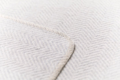 SILVRETTA throw "herringbone" in . Throw Blanket made by David Fussenegger , a family-run mill in Austria.