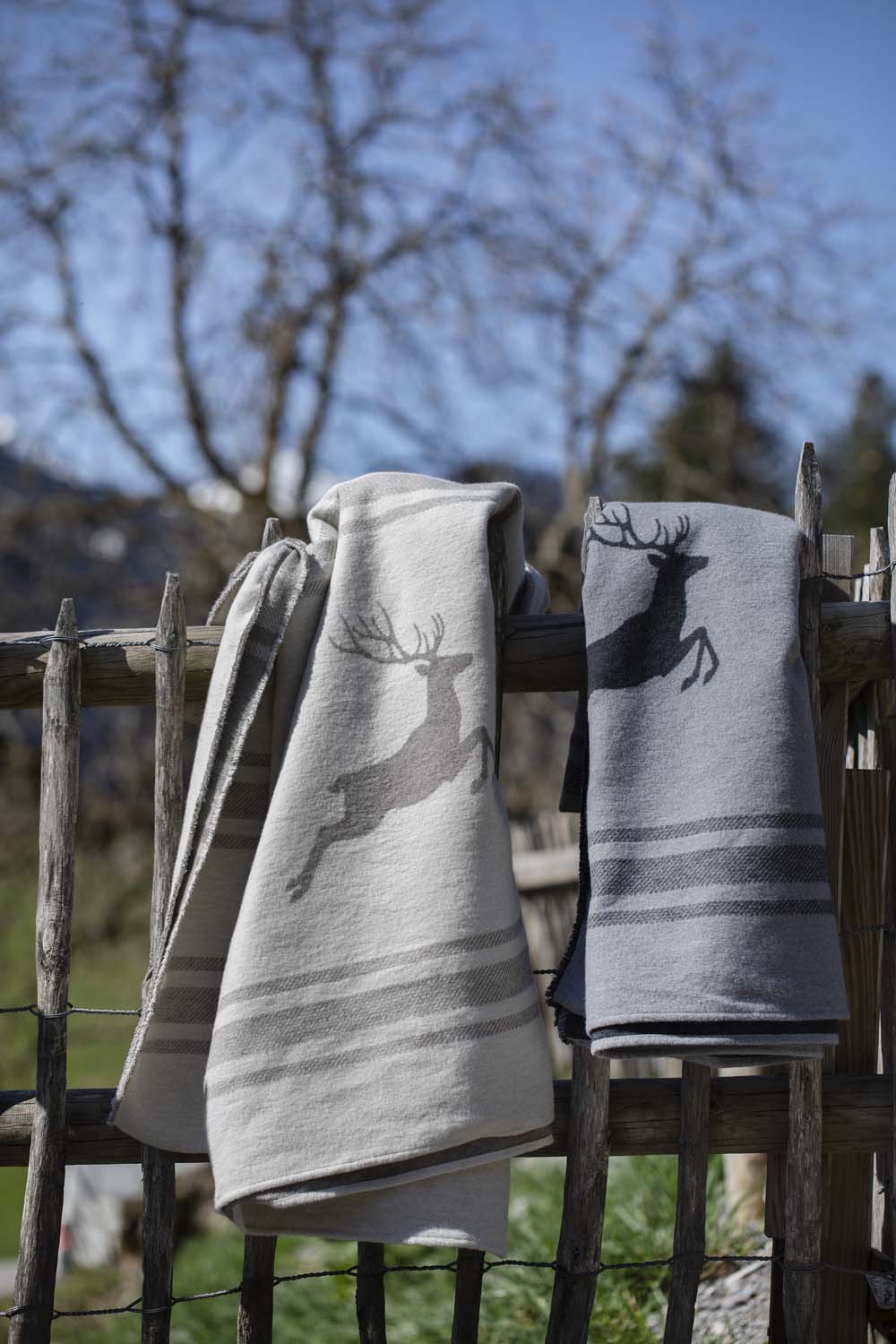 LUCA throw flannel "jumping stag / stripes" in . Throw Blanket made by David Fussenegger , a family-run mill in Austria.