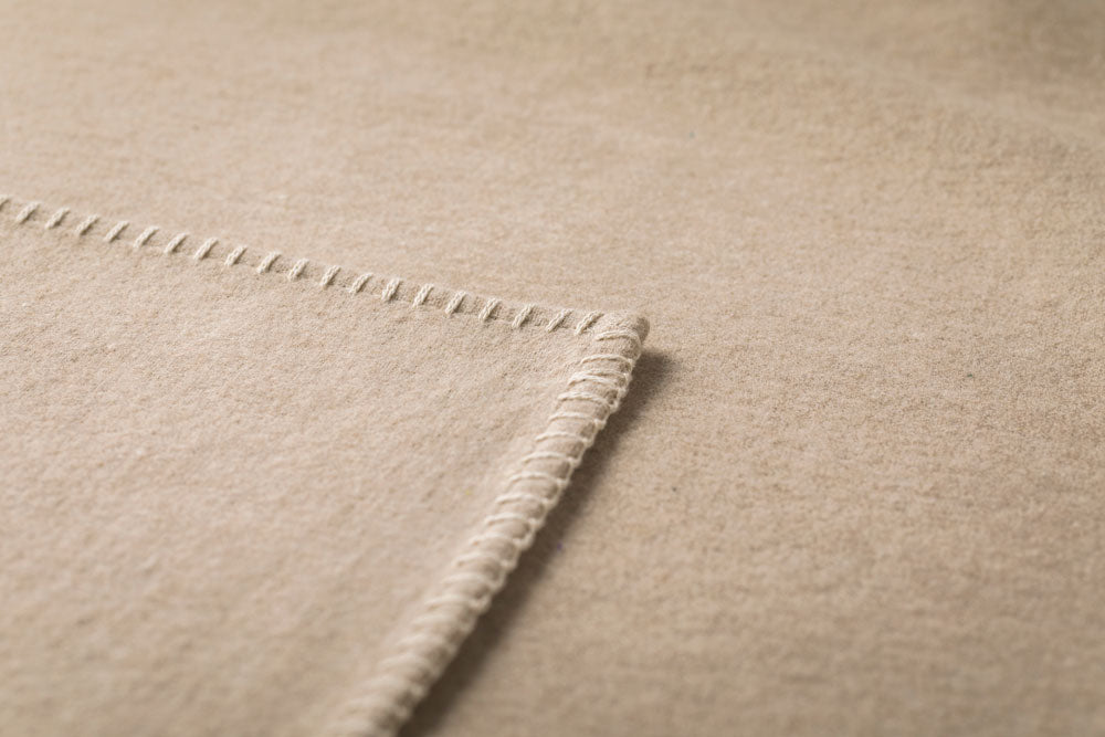 SYLT throw solid in . Throw Blanket made by David Fussenegger , a family-run mill in Austria.