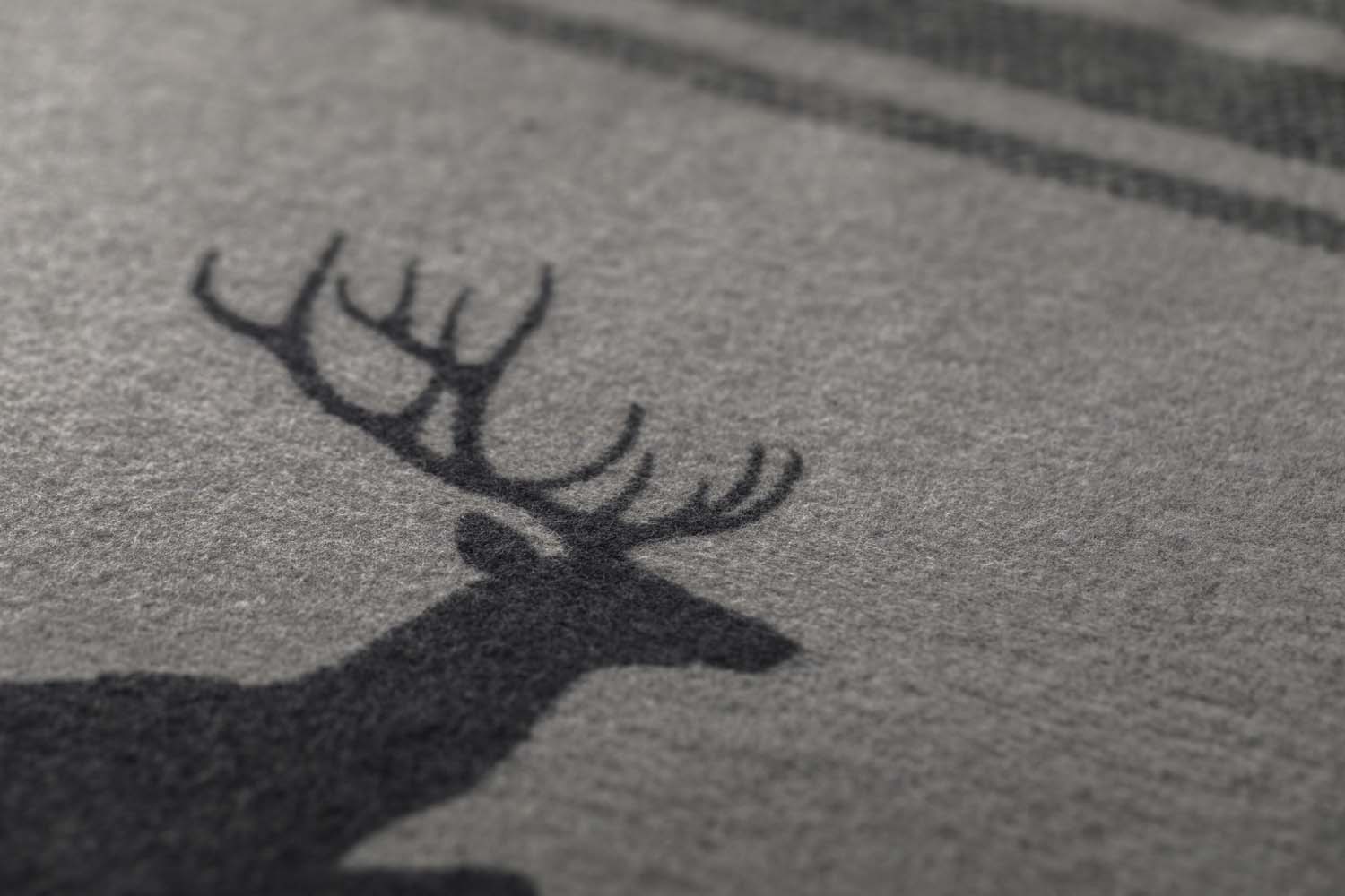 LUCA throw flannel "jumping stag / stripes" in . Throw Blanket made by David Fussenegger , a family-run mill in Austria.
