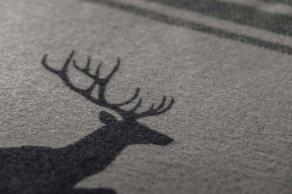 LUCA throw flannel "jumping stag / stripes" in . Throw Blanket made by David Fussenegger , a family-run mill in Austria.