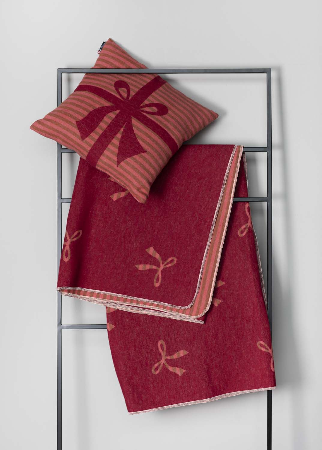 SILVRETTA throw "bows allover" in . Throw Blanket made by David Fussenegger , a family-run mill in Austria.