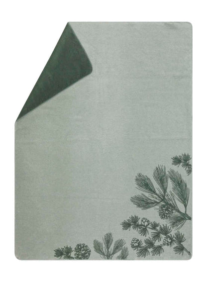 SAVONA throw "pine cone trees" in green . Throw Blanket made by David Fussenegger , a family-run mill in Austria.