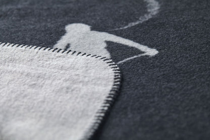 SAVONA throw "skiers leaving tracks" in . Throw Blanket made by David Fussenegger , a family-run mill in Austria.