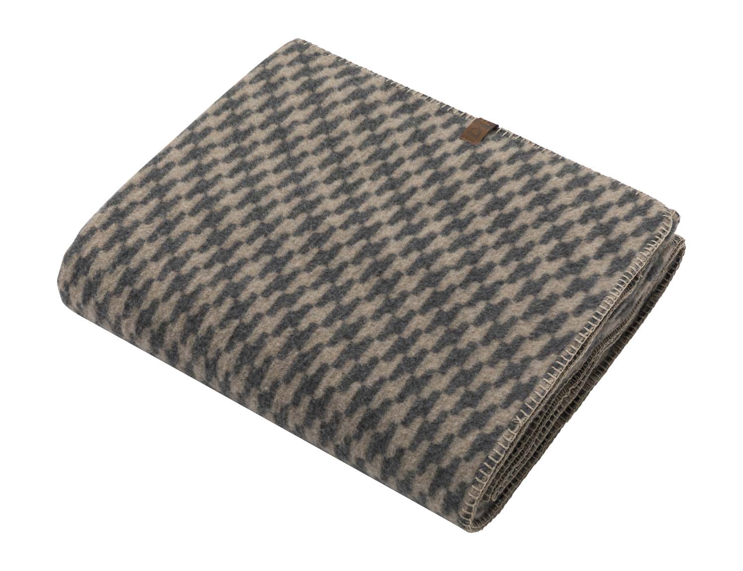 MERANO throw "houndstooth" in . made by INDIGO 11 , a family-run mill in Austria.