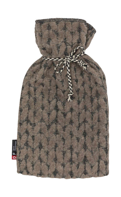 SILVRETTA warming bottle "knitted" in smoke . Warming Bottle made by David Fussenegger , a family-run mill in Austria.