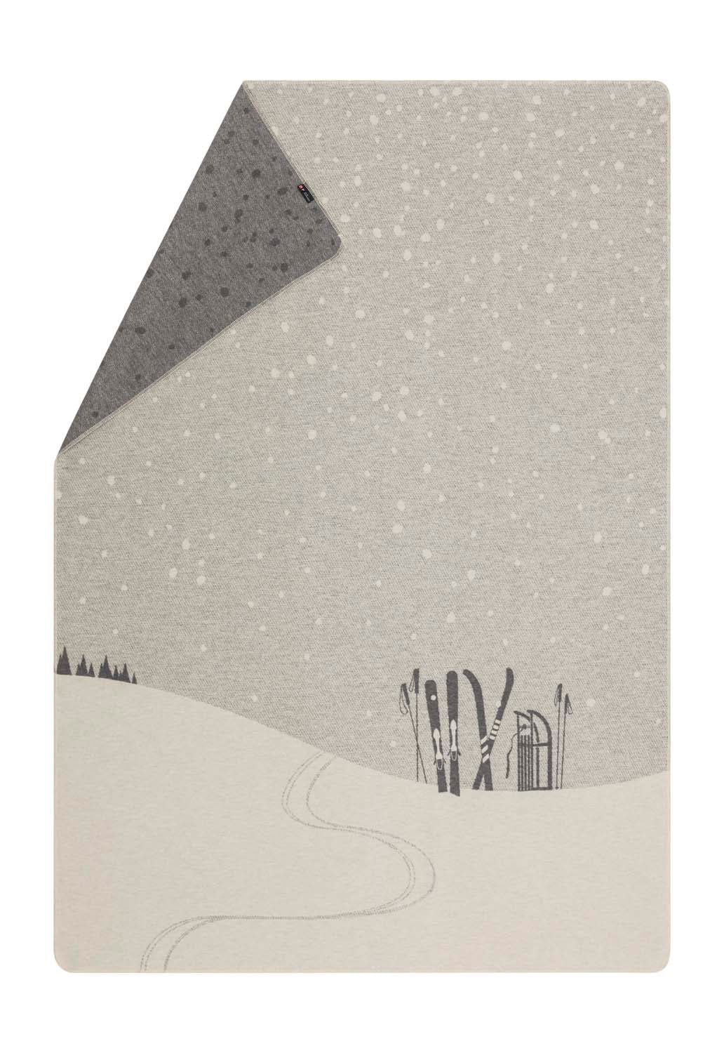 SILVRETTA throw "skis & tobbogan" in offwhite . Throw Blanket made by David Fussenegger , a family-run mill in Austria.