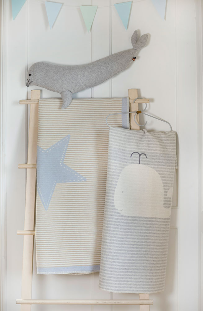 JUWEL pillow "seal" includes filling in . Filled Cushion made by David Fussenegger , a family-run mill in Austria.