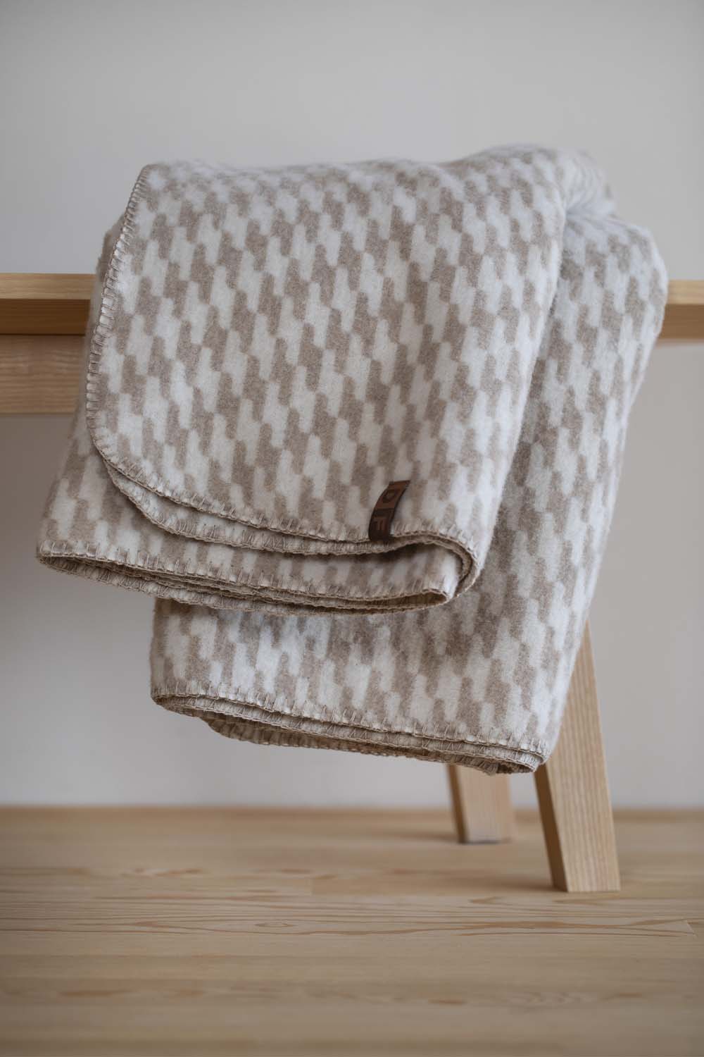 MERANO throw "houndstooth" in . made by INDIGO 11 , a family-run mill in Austria.