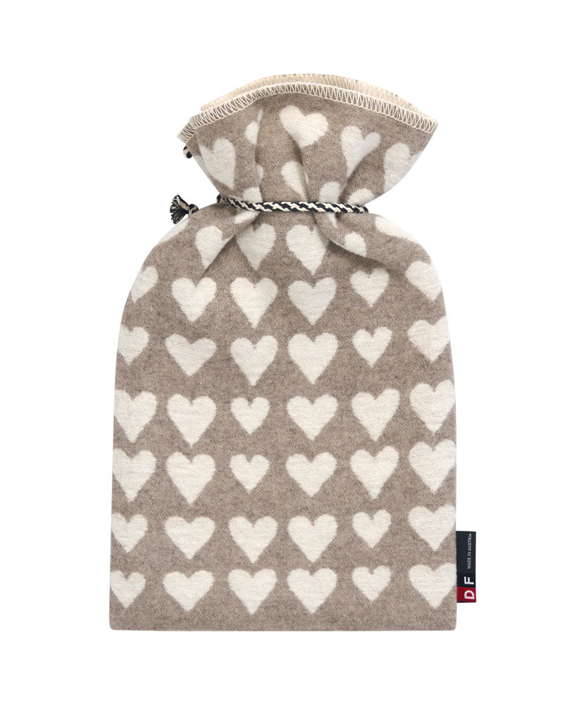 SILVRETTA warming bottle "hearts" in . Warming Bottle made by David Fussenegger , a family-run mill in Austria.