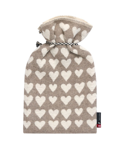 SILVRETTA warming bottle "hearts" in . Warming Bottle made by David Fussenegger , a family-run mill in Austria.