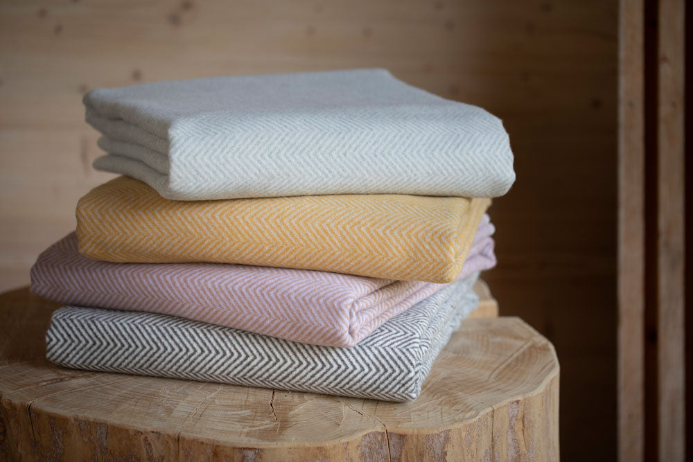 SILVRETTA throw "herringbone" in . Throw Blanket made by David Fussenegger , a family-run mill in Austria.