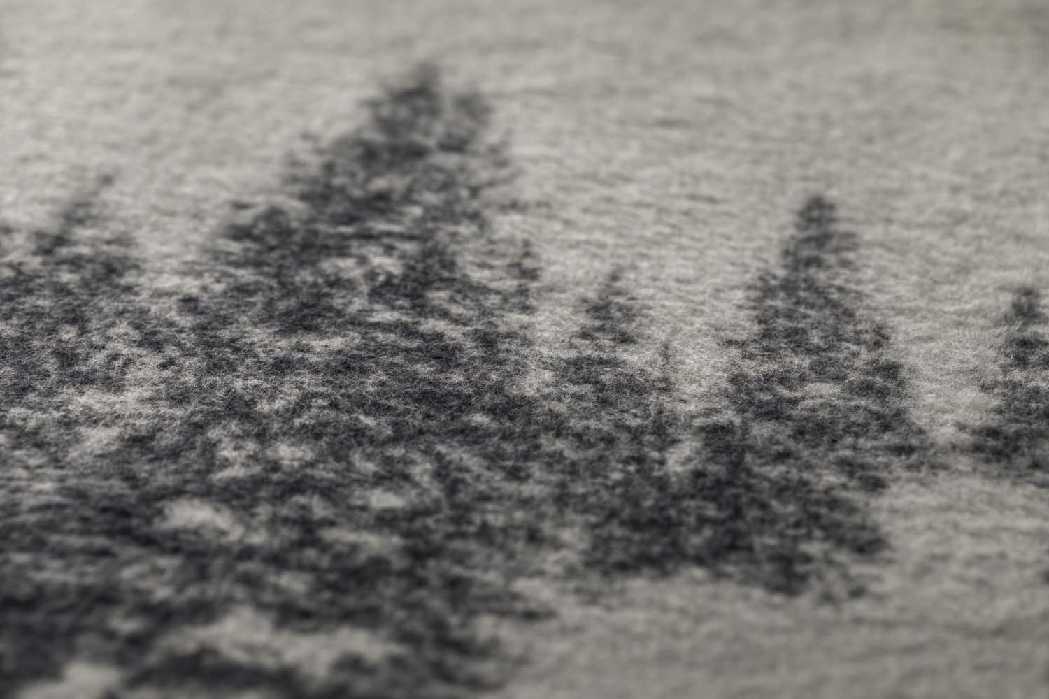 SAVONA throw "snowy trees/stag" in . Throw Blanket made by David Fussenegger , a family-run mill in Austria.