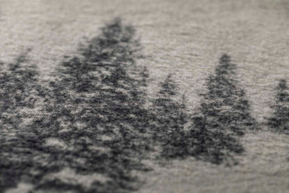 SAVONA throw "snowy trees/stag" in . Throw Blanket made by David Fussenegger , a family-run mill in Austria.
