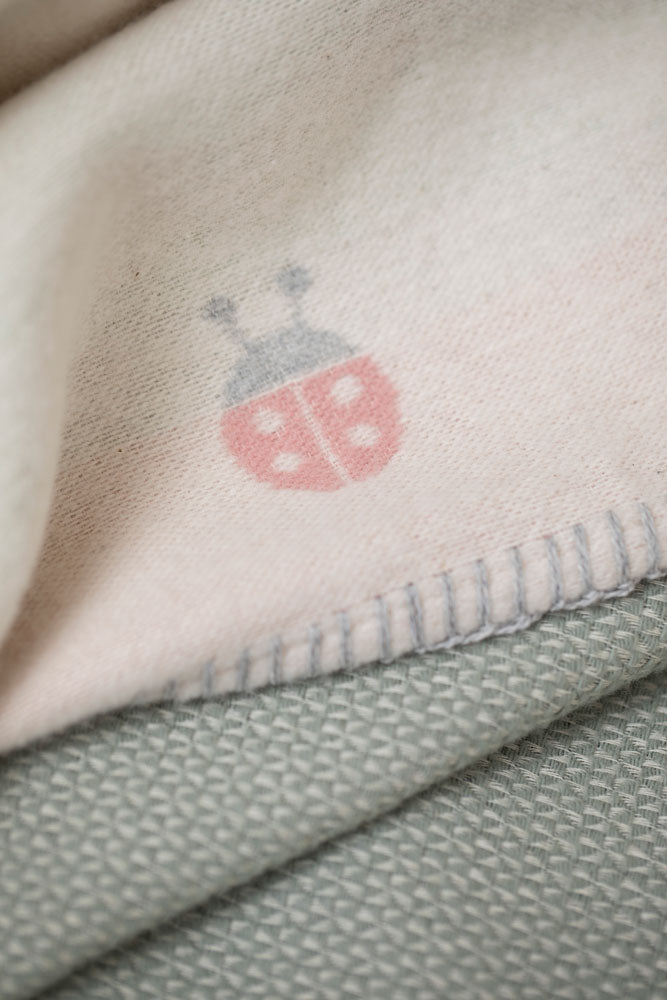 LENA baby blanket organic "ladybugs" in . Blanket made by David Fussenegger , a family-run mill in Austria.