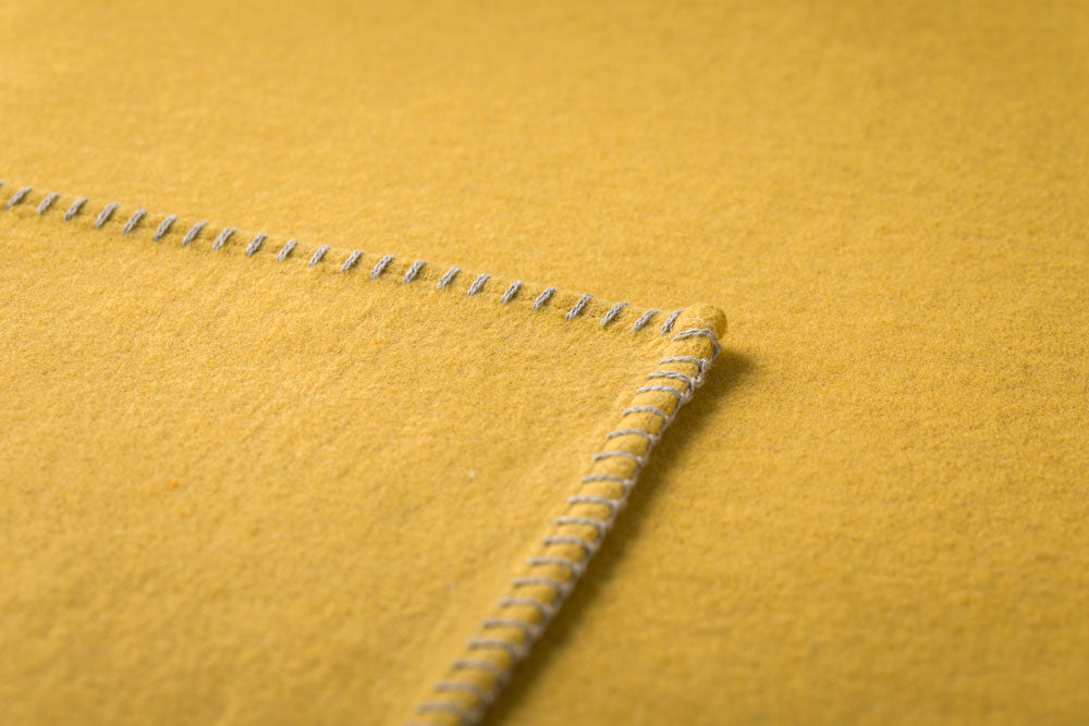 SYLT throw solid in . Throw Blanket made by David Fussenegger , a family-run mill in Austria.