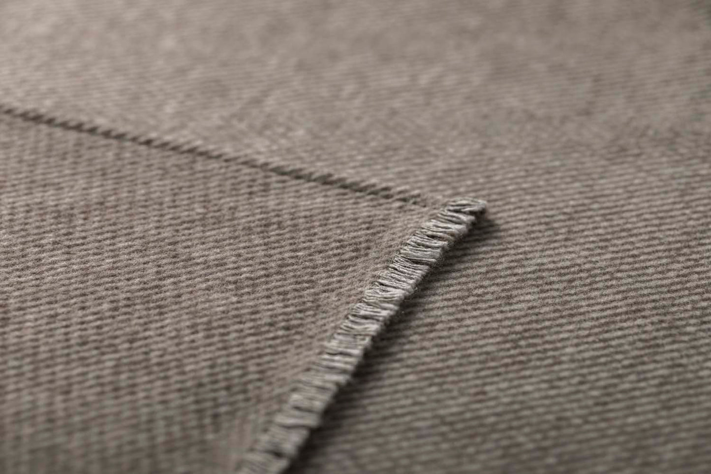 LUCA throw "pairs of stags" in . Throw Blanket made by David Fussenegger , a family-run mill in Austria.