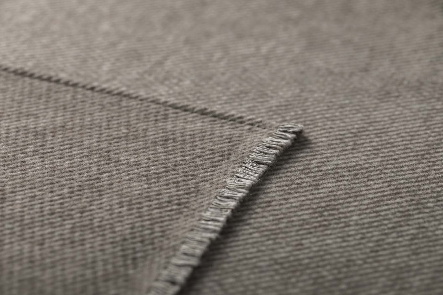 LUCA throw "pairs of stags" in . Throw Blanket made by David Fussenegger , a family-run mill in Austria.