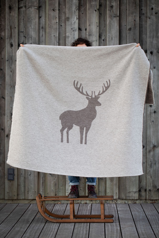 LUCA throw "centered deer" in . Throw Blanket made by David Fussenegger , a family-run mill in Austria.