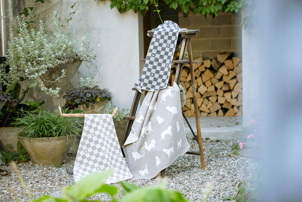 PET blanket "cat silhouettes allover" in . Pet Blanket made by David Fussenegger , a family-run mill in Austria.
