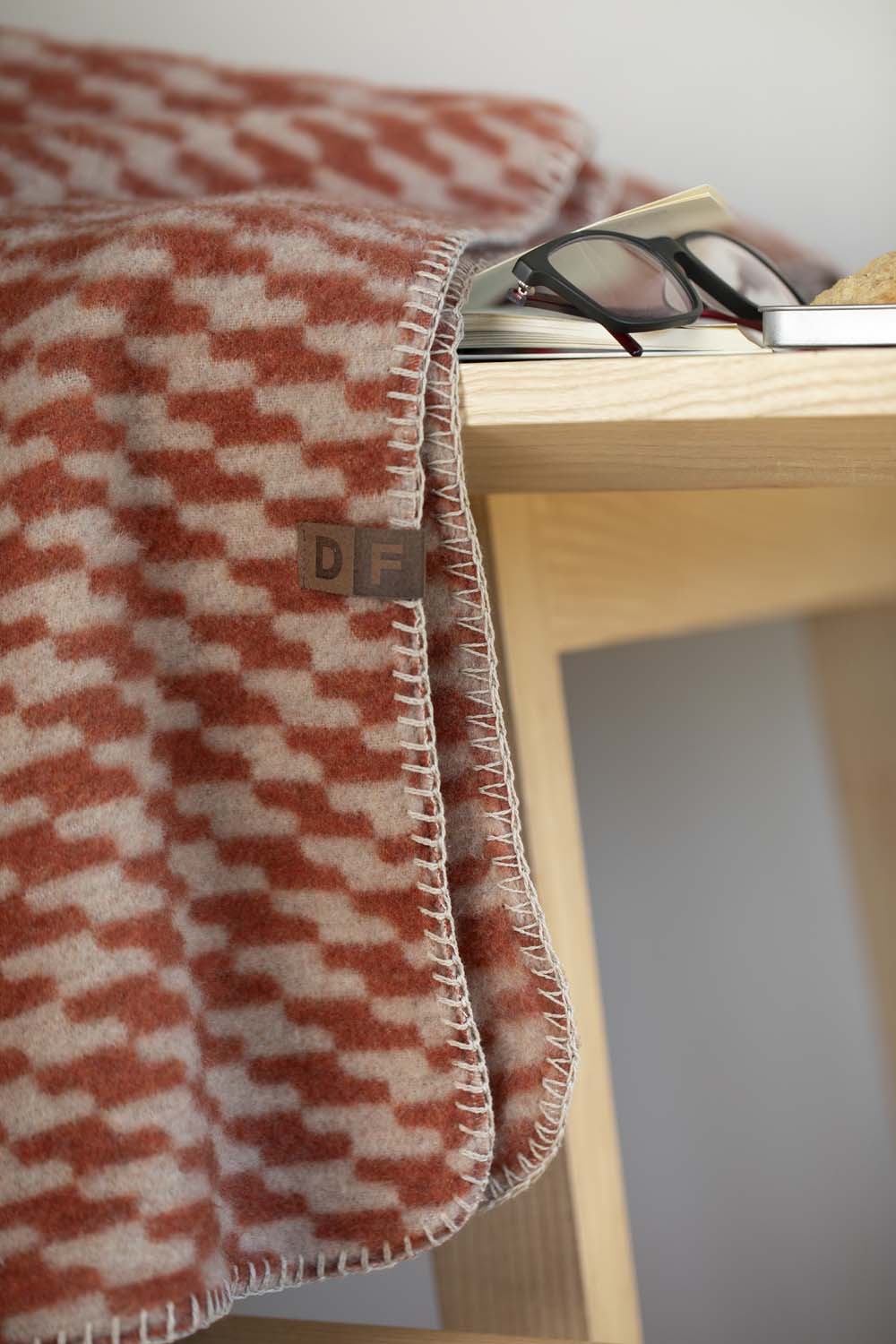 MERANO throw "houndstooth" in . made by INDIGO 11 , a family-run mill in Austria.