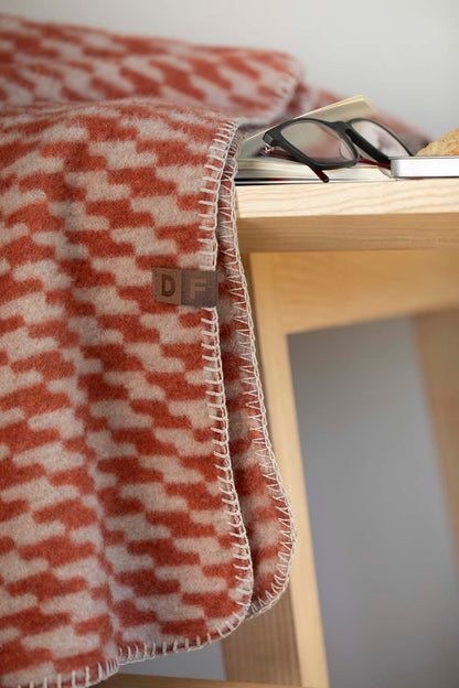 MERANO throw "houndstooth" in . made by INDIGO 11 , a family-run mill in Austria.