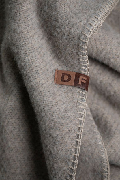 MERANO Throw "Solid" in . Throw Blanket made by David Fussenegger , a family-run mill in Austria.