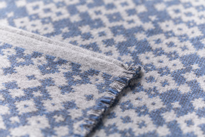 NOVA throw "small ethnic pattern" in . Throw Blanket made by David Fussenegger , a family-run mill in Austria.