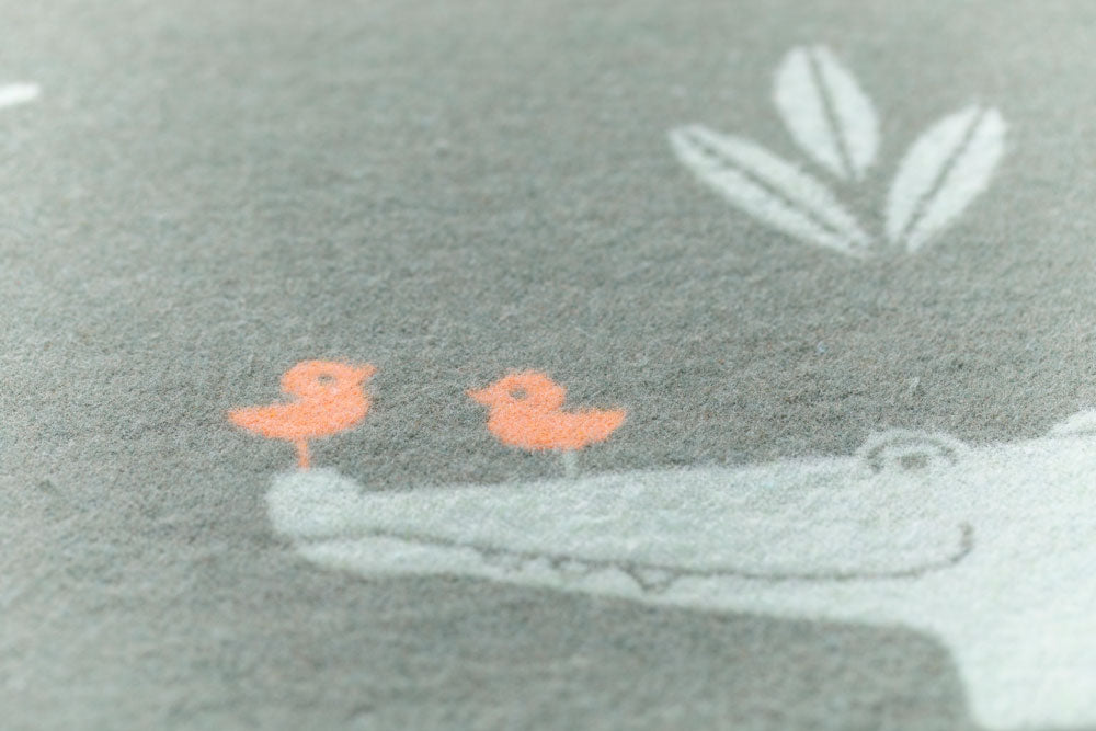 JUWEL baby blanket "crocodiles allover" in . Blanket made by David Fussenegger , a family-run mill in Austria.