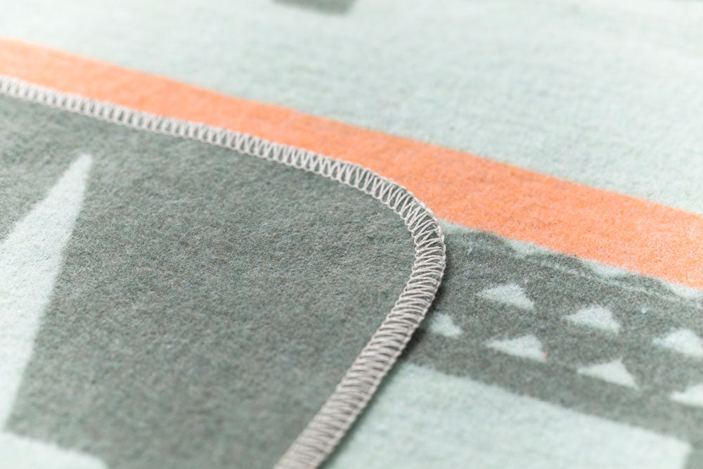 JUWEL baby blanket "crocodiles allover" in . Blanket made by David Fussenegger , a family-run mill in Austria.