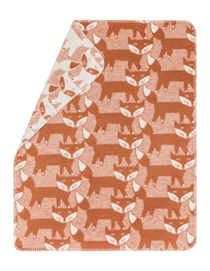 MILA baby blanket "pack of foxes" in brown . Blanket made by David Fussenegger , a family-run mill in Austria.