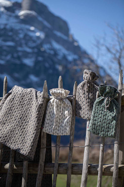 SILVRETTA warming bottle "knitted" in . Warming Bottle made by David Fussenegger , a family-run mill in Austria.