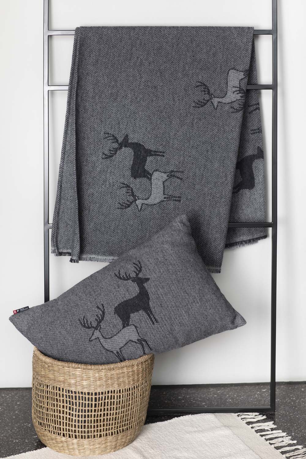 LUCA throw "pairs of stags" in . Throw Blanket made by David Fussenegger , a family-run mill in Austria.