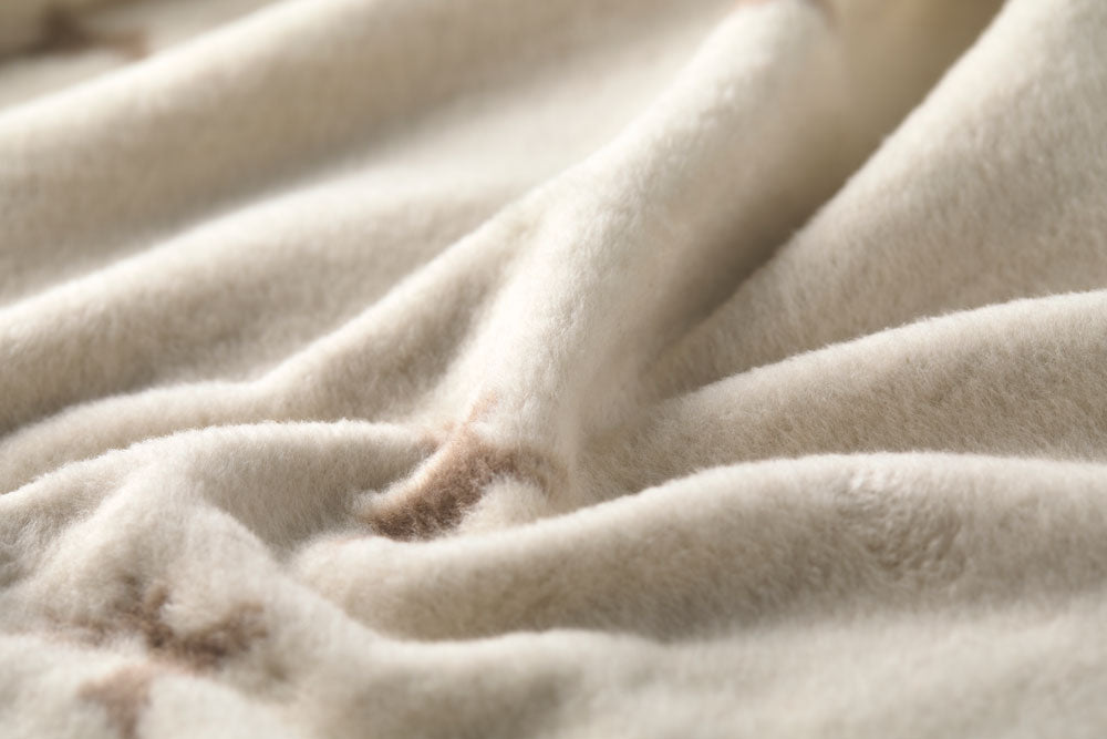 SAVONA throw "deer allover" in . Throw Blanket made by David Fussenegger , a family-run mill in Austria.