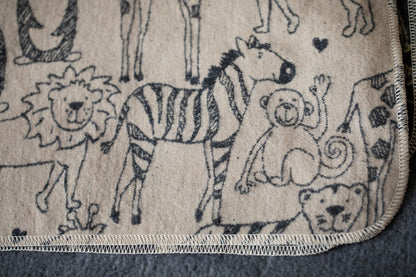 JUWEL baby blanket "safari animals" in . Blanket made by David Fussenegger , a family-run mill in Austria.