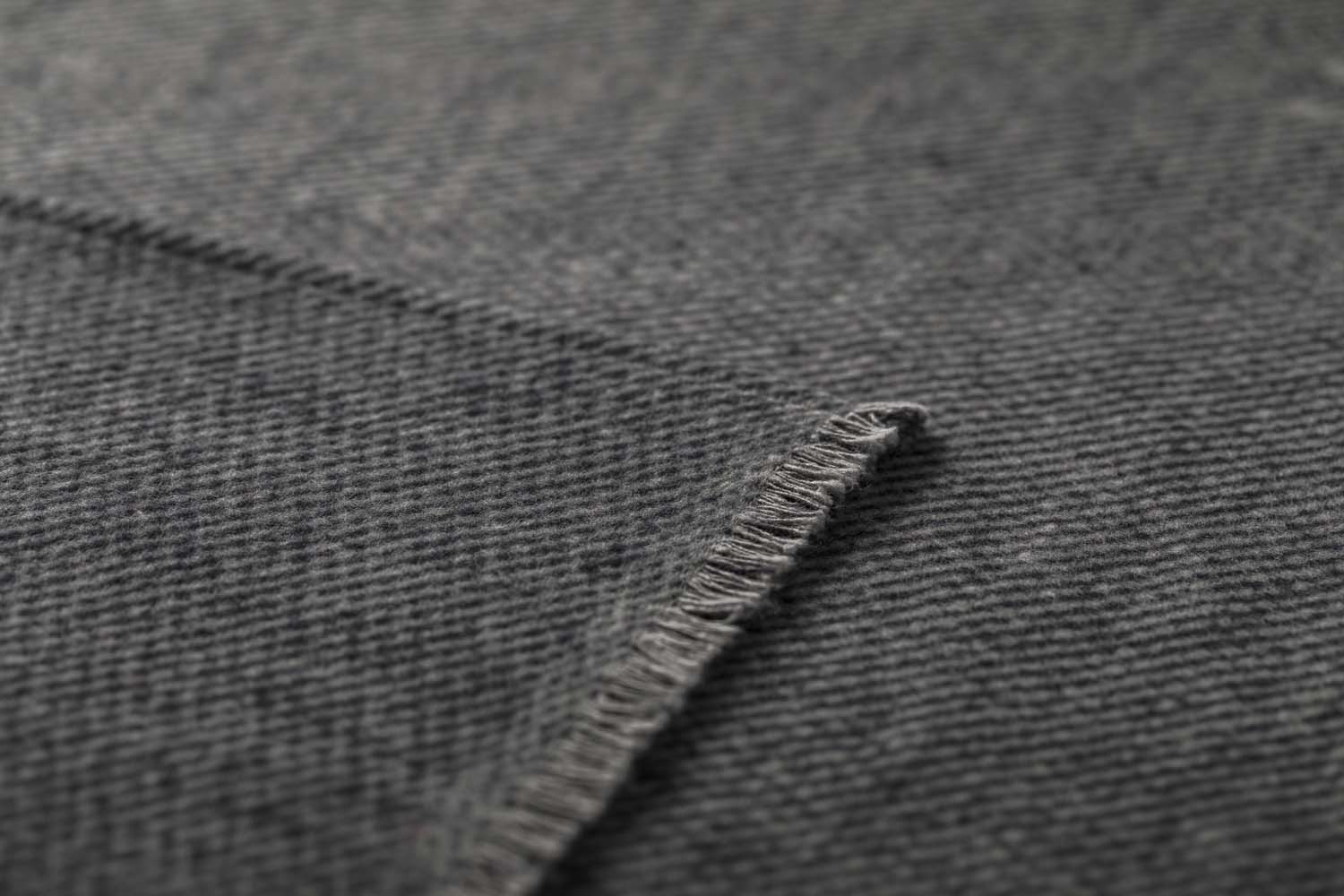 LUCA throw "pairs of stags" in . Throw Blanket made by David Fussenegger , a family-run mill in Austria.